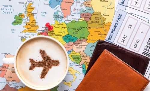 Airplane,Made,Of,Cinnamon,In,Cappuccino,,Passports,,Europe,Map,And Reiseunterlage mit Kaffeetasse 394181314 scaled 500x0 c default