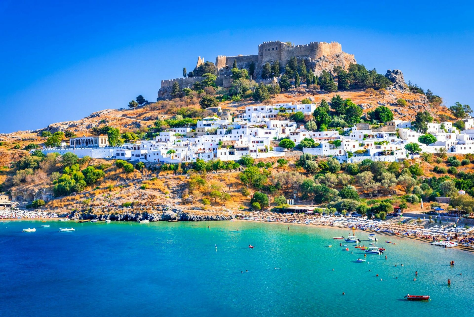 Rhodes,,Greece.,Lindos,Small,Whitewashed,Village,And,The,Acropolis,,Scenery lindos 1205309086 scaled