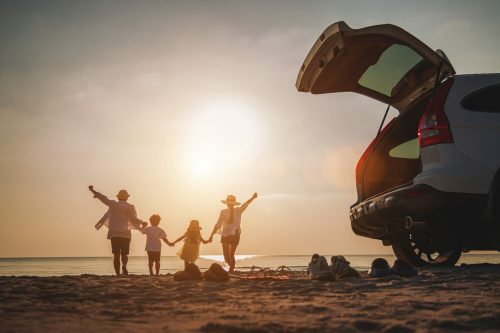 Family,Vacation,Holiday,,Happy,Family,Running,On,The,Beach,In shutterstock 1571201941 scaled 500x0 c default