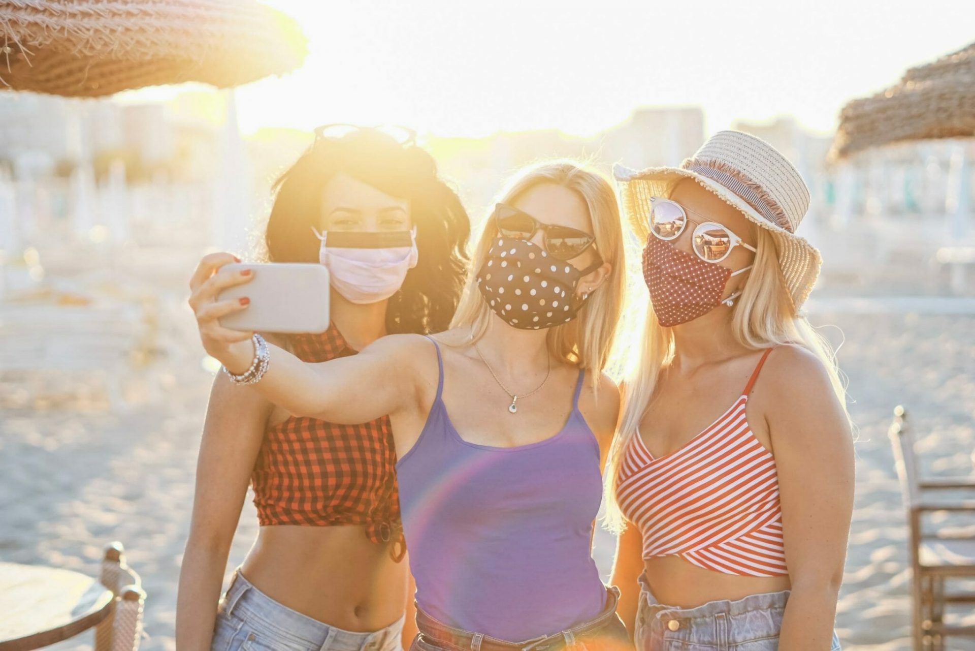 Girls,Taking,A,Selfie,With,Face,Mask,Outside,For,Coronavirus shutterstock 1772364578 scaled